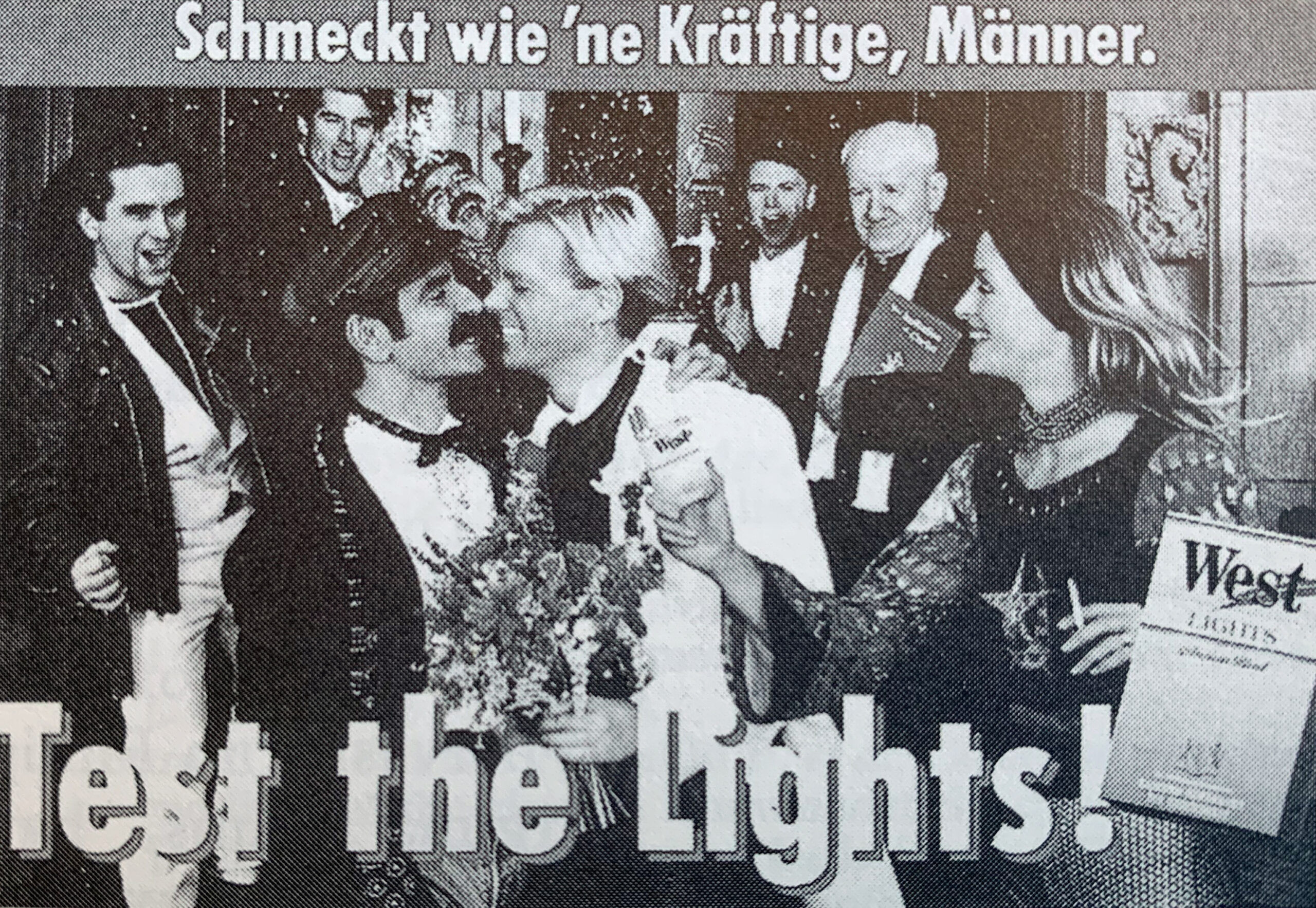 German cigarette ad from the early 1990s with the caption ''Schmeckt wie 'ne Kraftige, Manner. Test the Lights!''